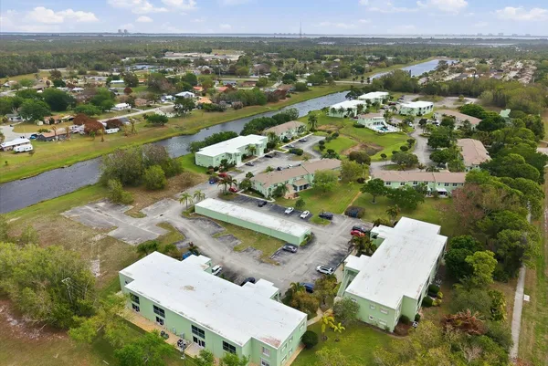 an aerial view of a house with a garden