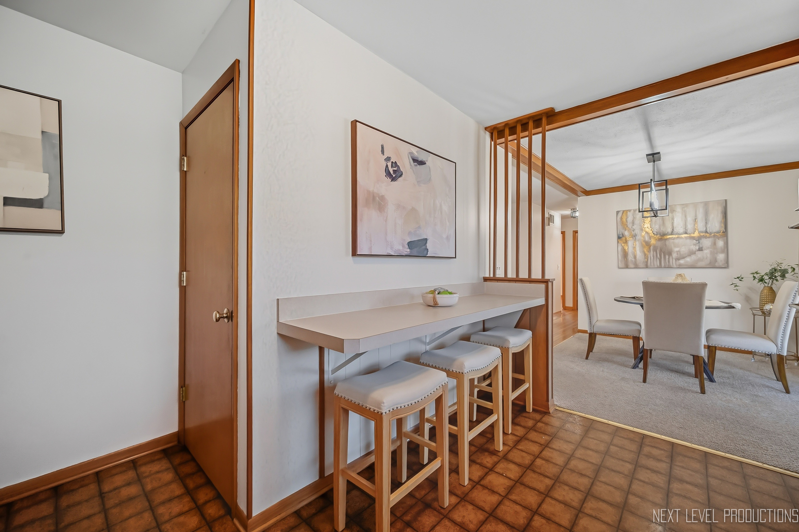 906 Carol Avenue Elgin, IL 60123 - Photo 17 of 31 a view of a dining room with furniture and a chandelier