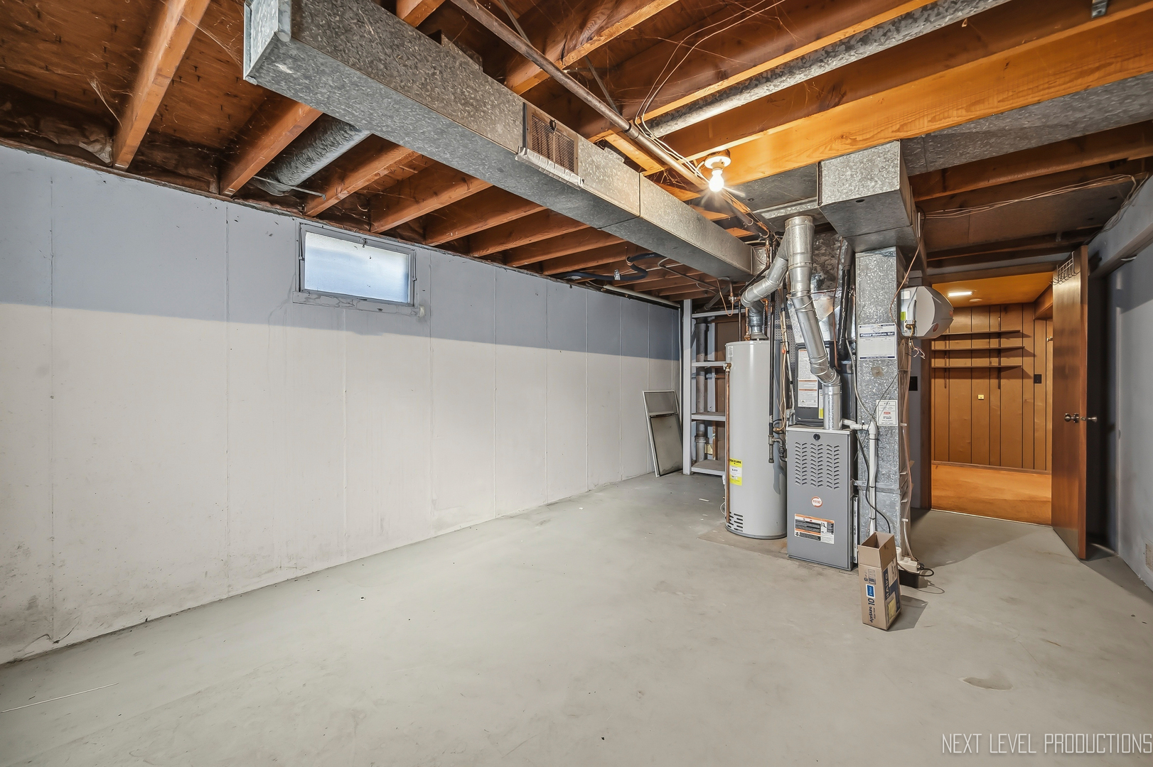 906 Carol Avenue Elgin, IL 60123 - Photo 23 of 31 a view of a room with wooden walls