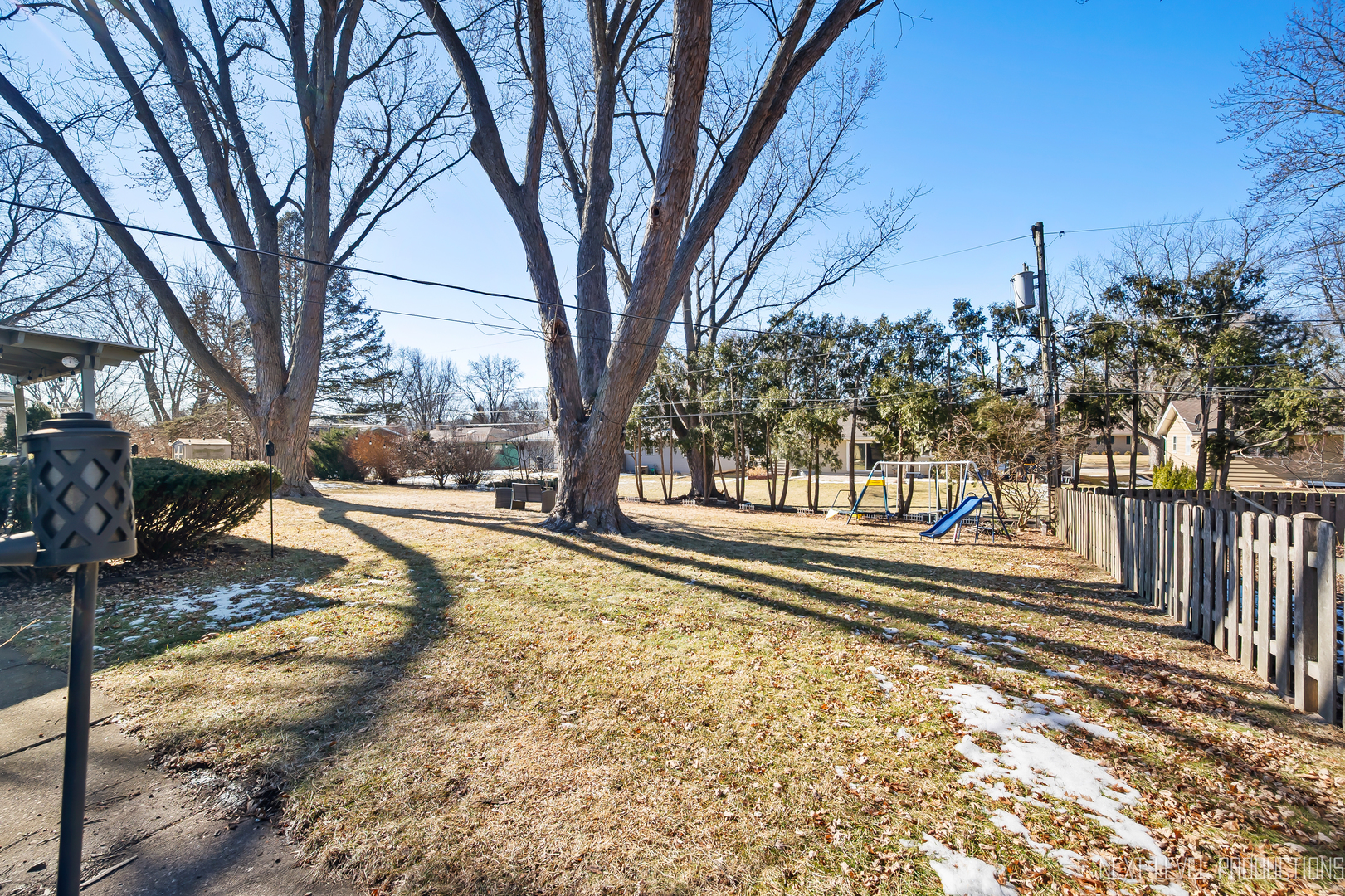 906 Carol Avenue Elgin, IL 60123 - Photo 28 of 31 a view of a yard with snow on the road