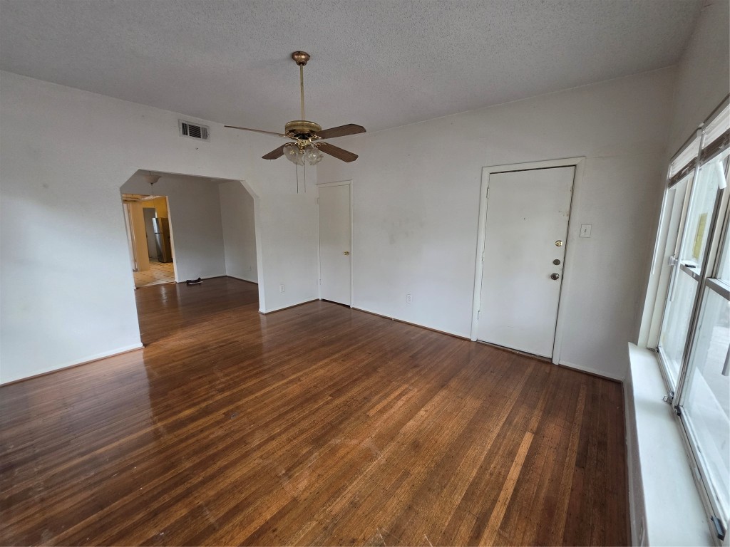 1226 West Gray Street, Unit 2 Houston, TX 77019 - Photo 7 of 14 a view of empty room with wooden floor