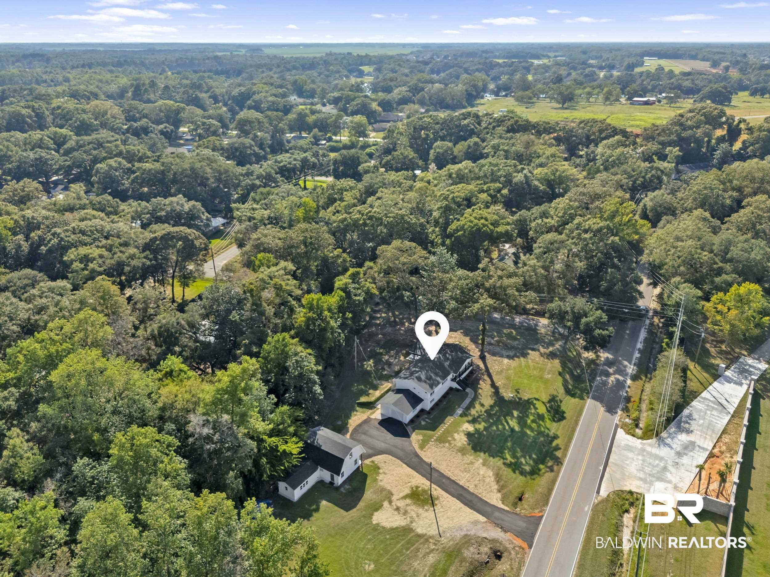 8351 Theodore Dawes Road Theodore, AL 36582 - Photo 44 of 46 Aerial view of property and surrounding area with a forest