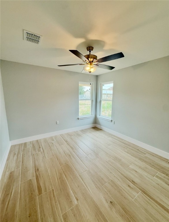 3939 Harvey Robstown, TX 78380 - Photo 11 of 17 wooden floor in an empty room