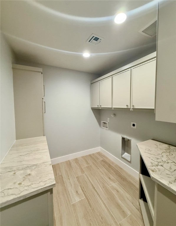 3939 Harvey Robstown, TX 78380 - Photo 15 of 17 a kitchen with a sink stove and cabinets
