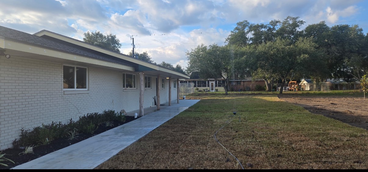 3939 Harvey Robstown, TX 78380 - Photo 3 of 17 a backyard of a house with lots of green space