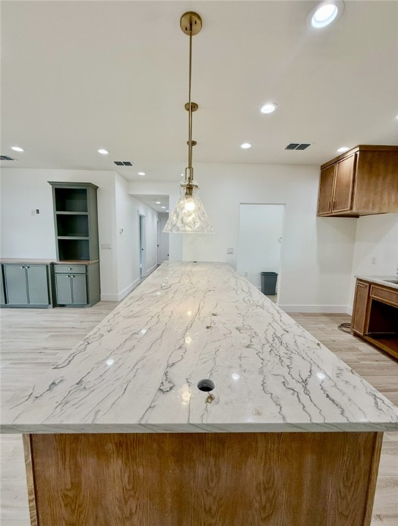 3939 Harvey Robstown, TX 78380 - Photo 5 of 17 a large kitchen with kitchen island sink and refrigerator