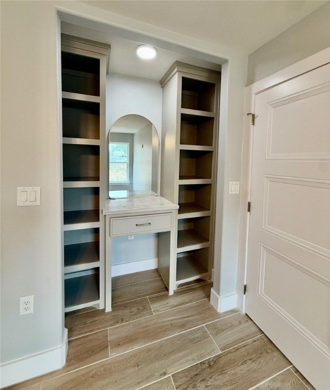 3939 Harvey Robstown, TX 78380 - Photo 9 of 17 a view of walk in closet with empty racks