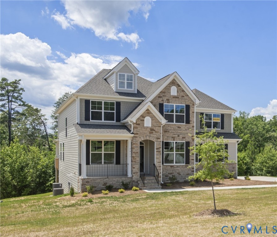 3917 Jett Court Gum Spring, VA 23065 - Photo 1 of 12 a front view of a house with a yard