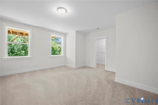 an empty room with windows