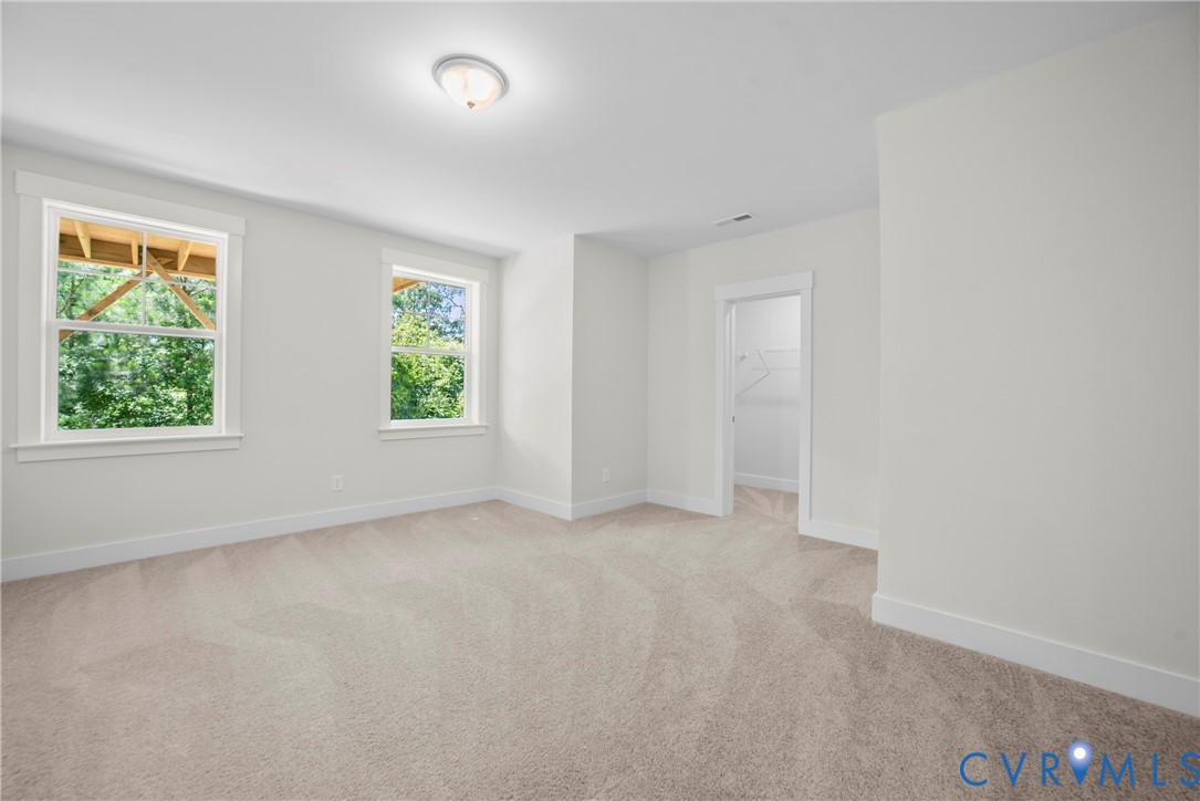 3917 Jett Court Gum Spring, VA 23065 - Photo 8 of 12 an empty room with windows