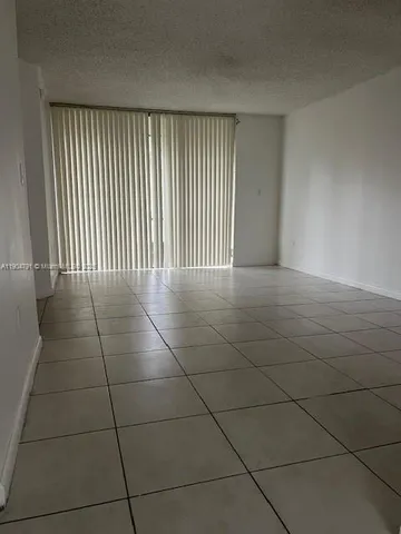 a view of a hallway with entryway