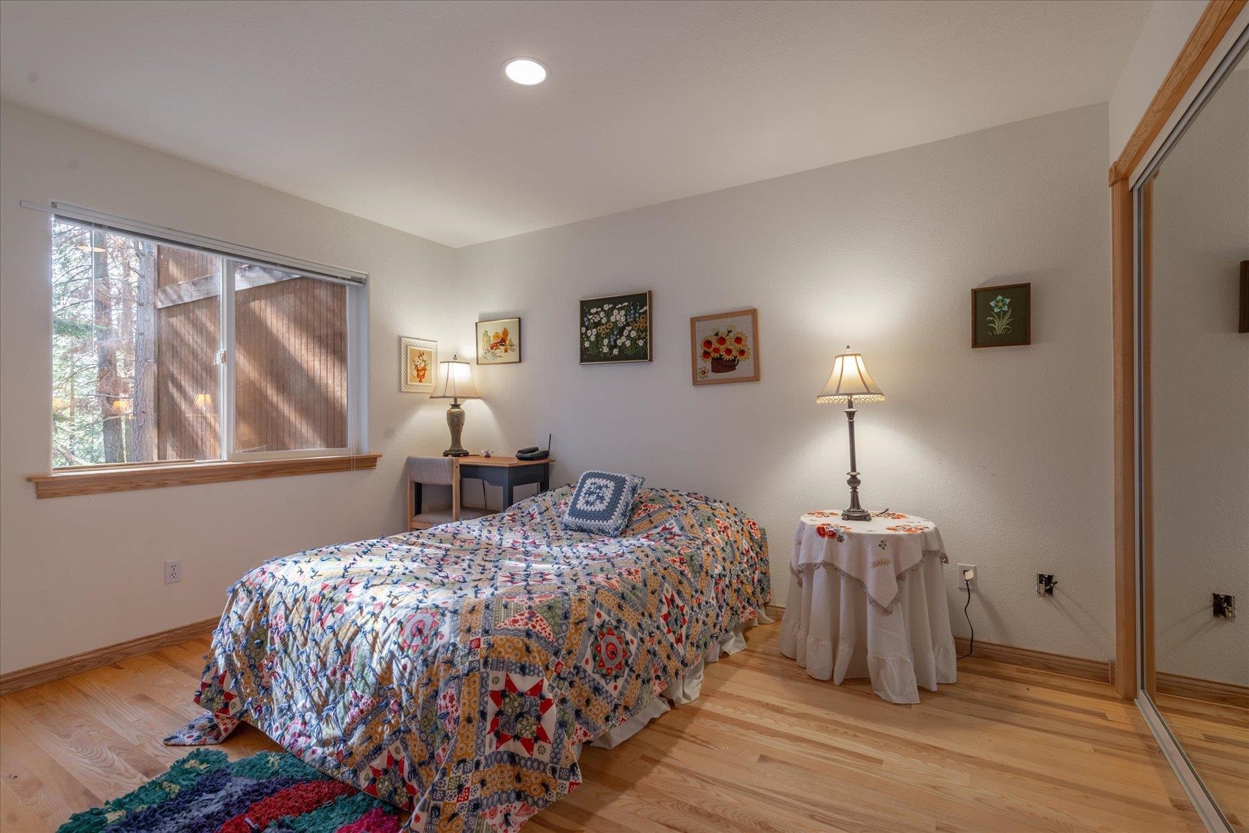 955 The Drive Tahoe City, CA 96145 - Photo 16 of 21 a bed sitting in a bedroom next to a window