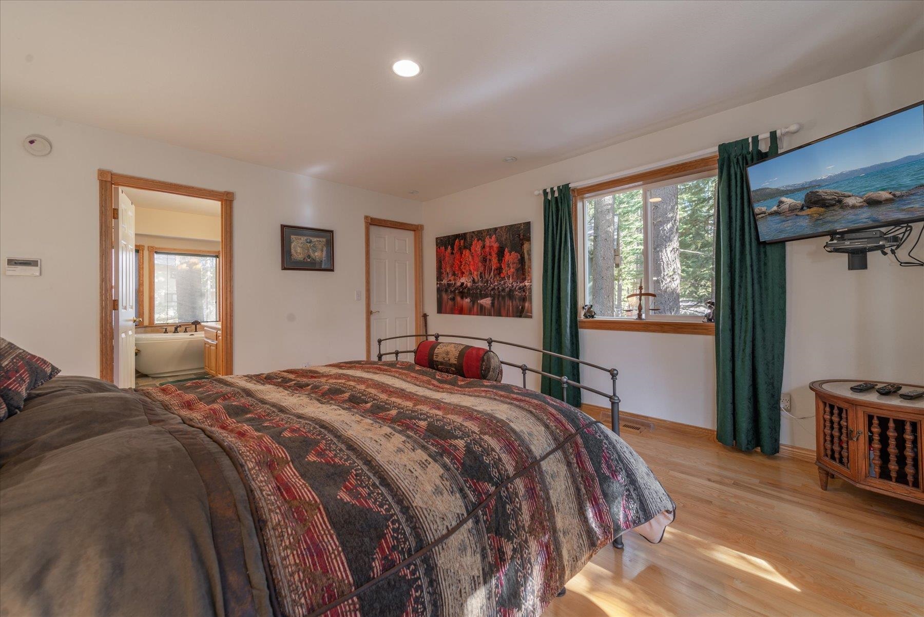 955 The Drive Tahoe City, CA 96145 - Photo 10 of 21 a bed sitting in a bedroom next to a window