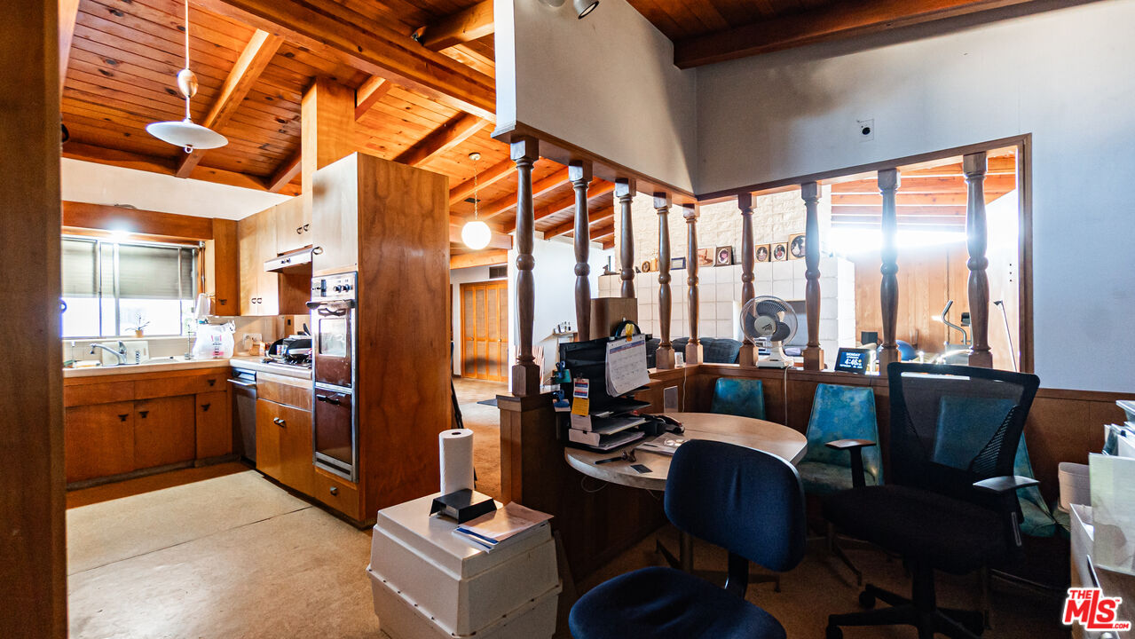 1408 251st Street Harbor City, CA 90710 - Photo 14 of 40 a living room with furniture and large windows