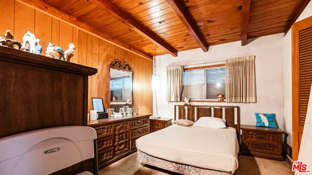 a bathroom with a sink vanity granite and a mirror