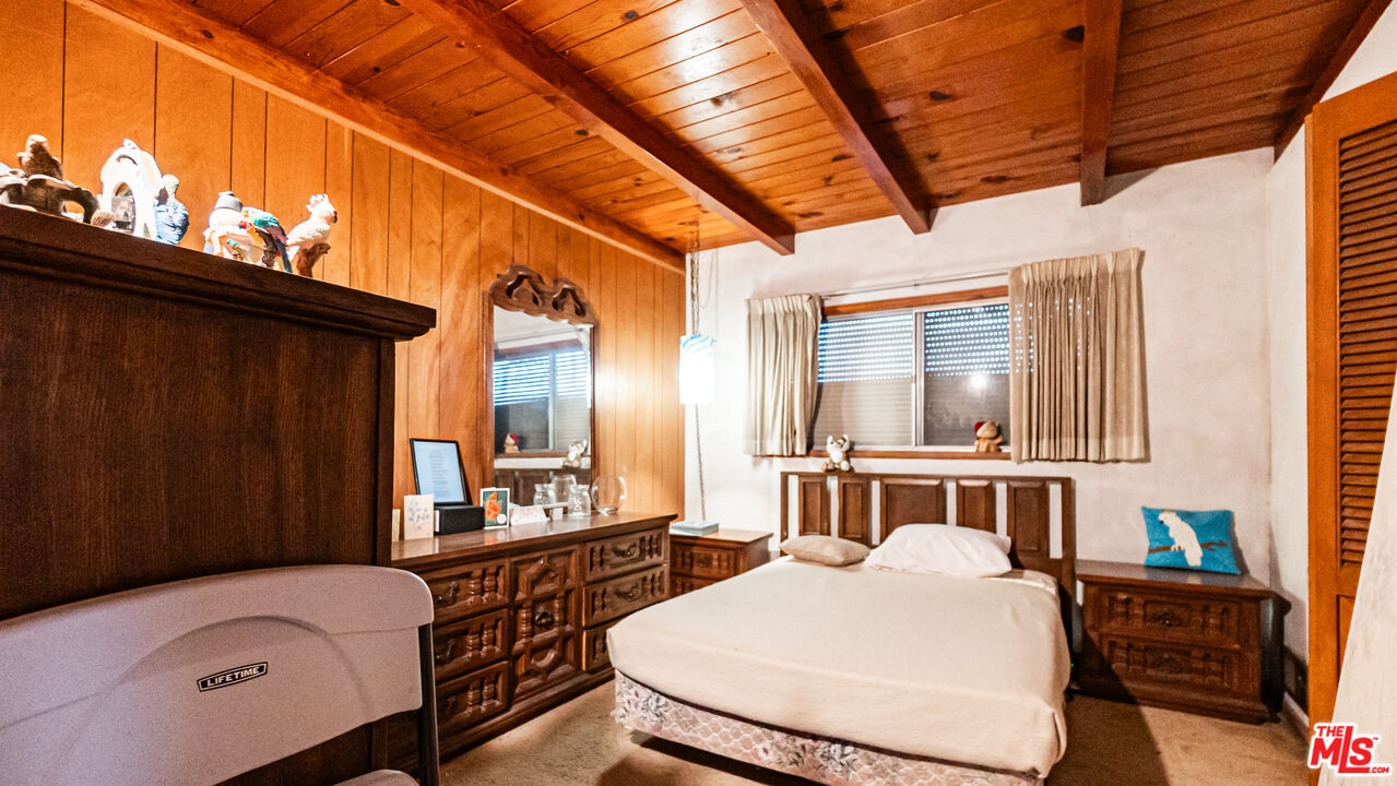 1408 251st Street Harbor City, CA 90710 - Photo 16 of 40 a bedroom with furniture and a wooden floor