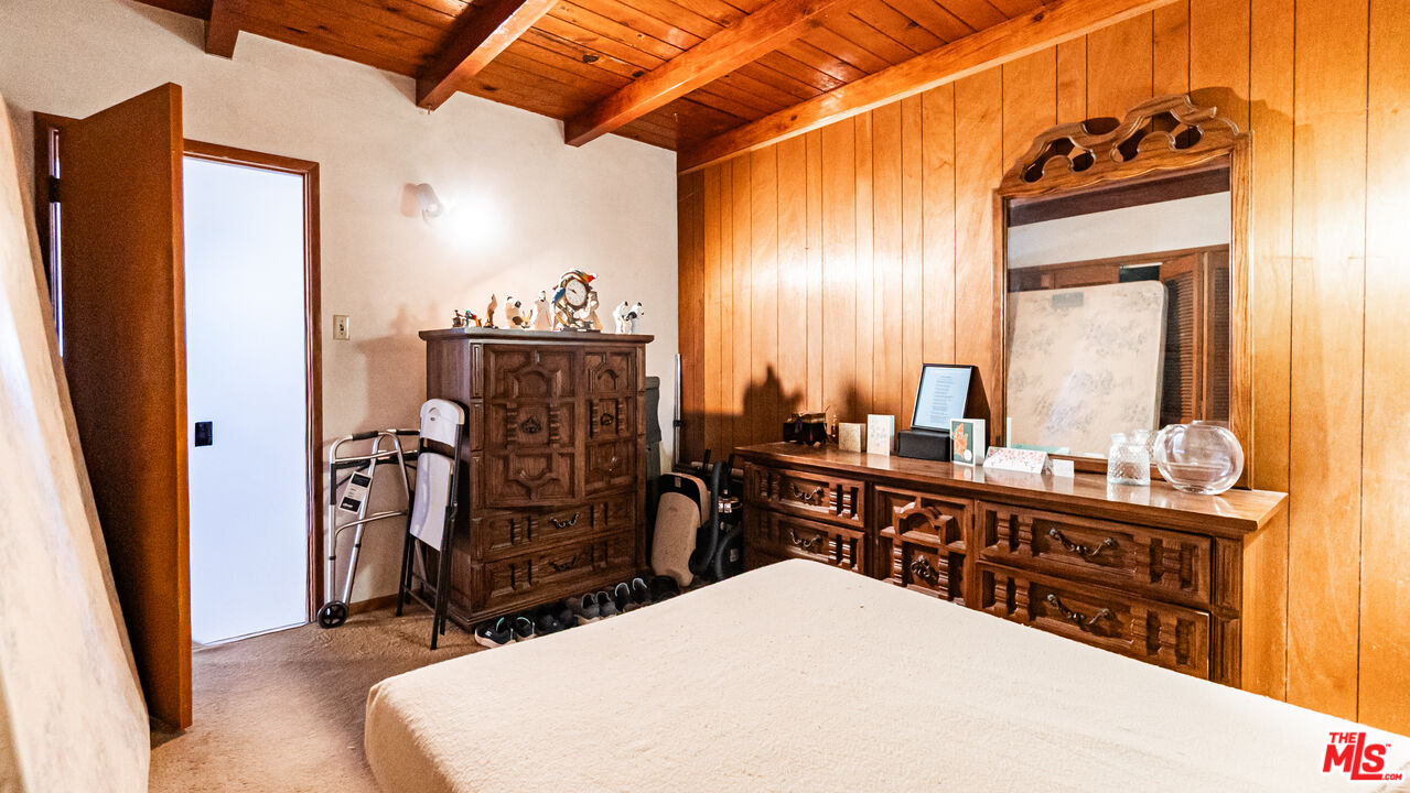 1408 251st Street Harbor City, CA 90710 - Photo 17 of 40 a bathroom with a sink a mirror and a shower
