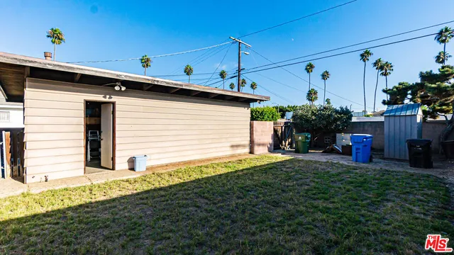a view of a back yard of the house