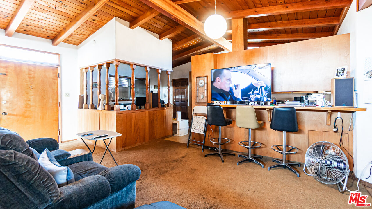 1408 251st Street Harbor City, CA 90710 - Photo 7 of 40 a living room with furniture and a window