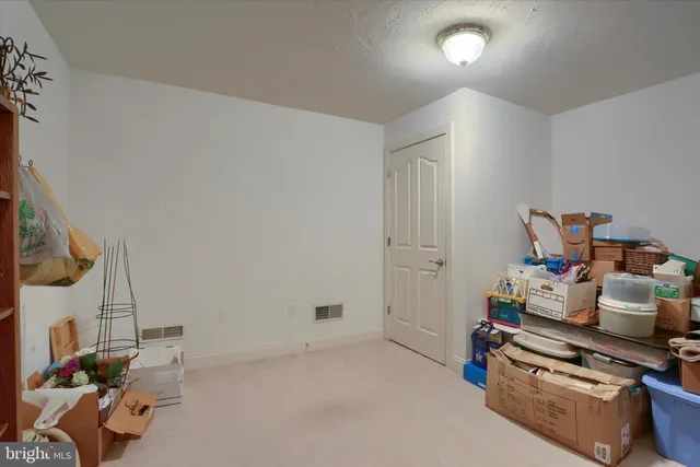 a room with furniture and a flat screen tv