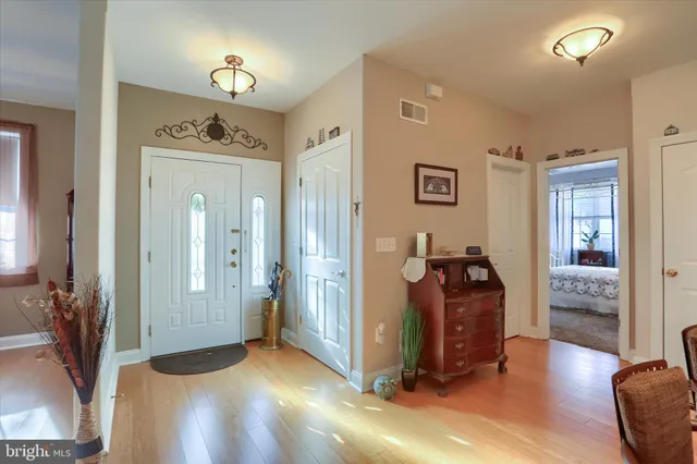 a view of a livingroom with furniture and windows