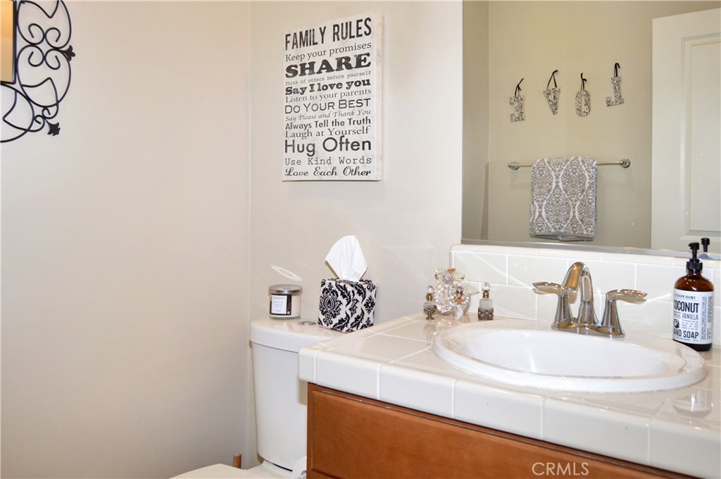 166 Fox Lane Calimesa, CA 92320 - Photo 59 of 76 3rd Bath - Half Bath Near the Entry is Perfect for Guests
