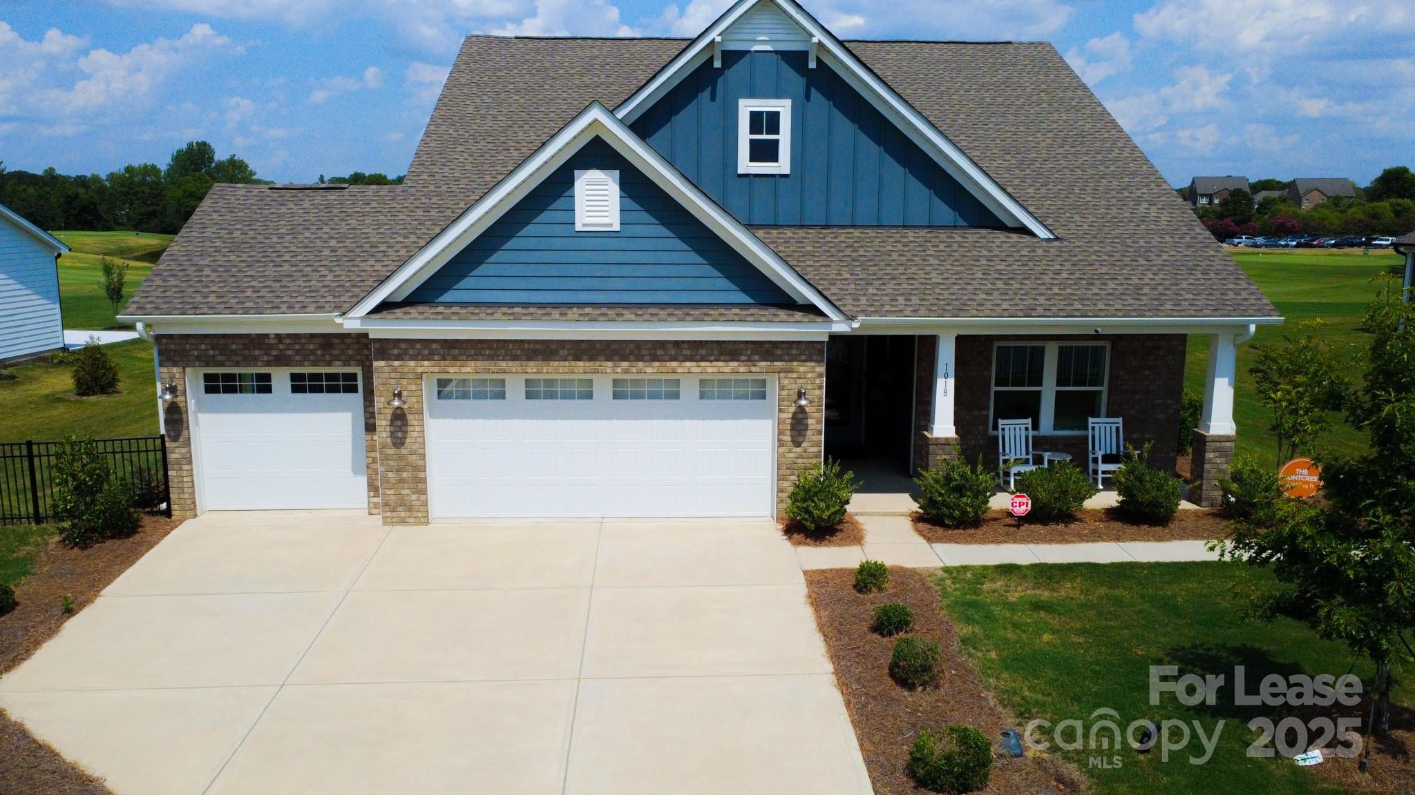 1018 Stone Marker Drive Monroe, NC 28112 - Photo 1 of 24 a house view with a garden space