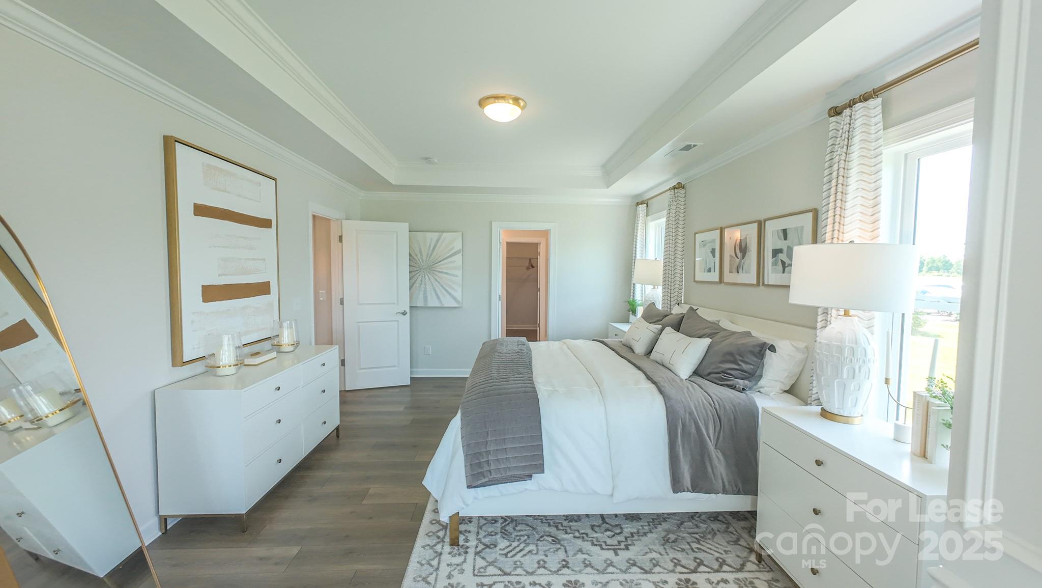 1018 Stone Marker Drive Monroe, NC 28112 - Photo 11 of 24 a bed room with a bed and a window