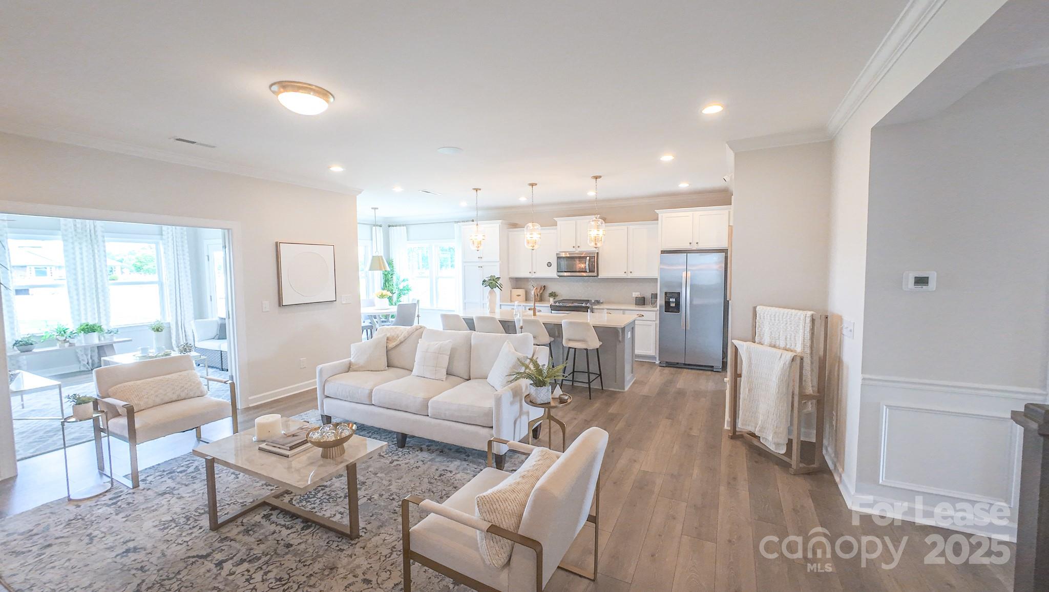 1018 Stone Marker Drive Monroe, NC 28112 - Photo 13 of 24 a living room with furniture and a large window