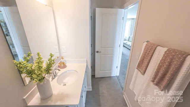a white bath tub sitting in a bathroom