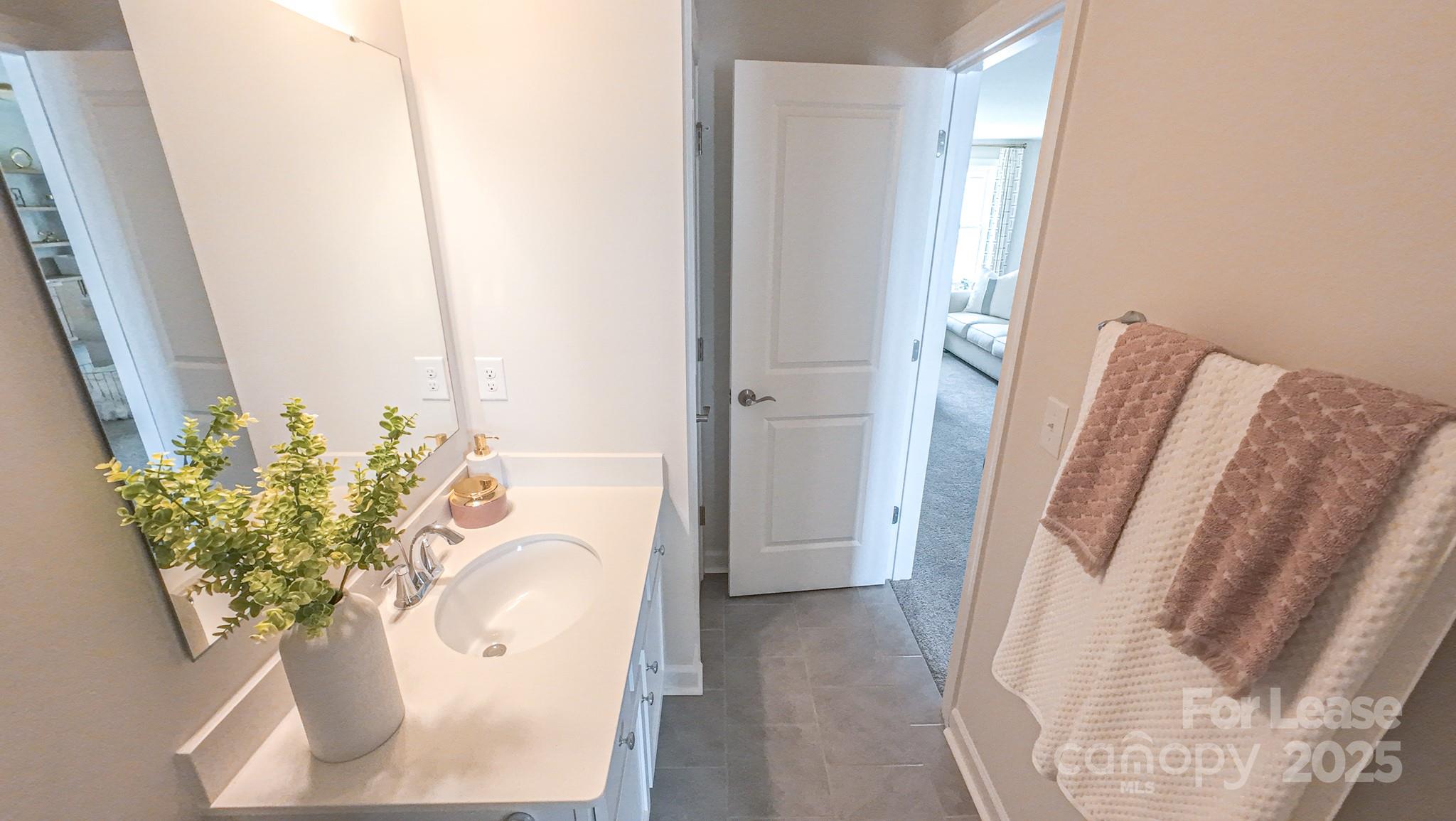 1018 Stone Marker Drive Monroe, NC 28112 - Photo 18 of 24 a white bath tub sitting in a bathroom