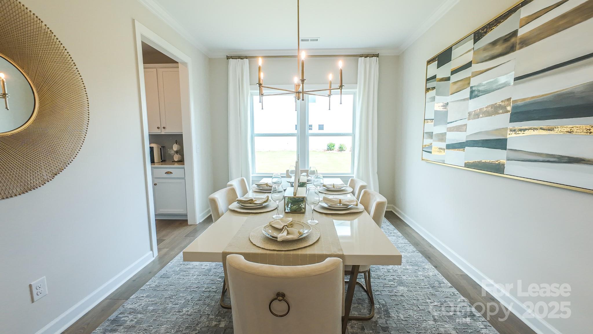 1018 Stone Marker Drive Monroe, NC 28112 - Photo 5 of 24 a view of a dining room with furniture window and outside view