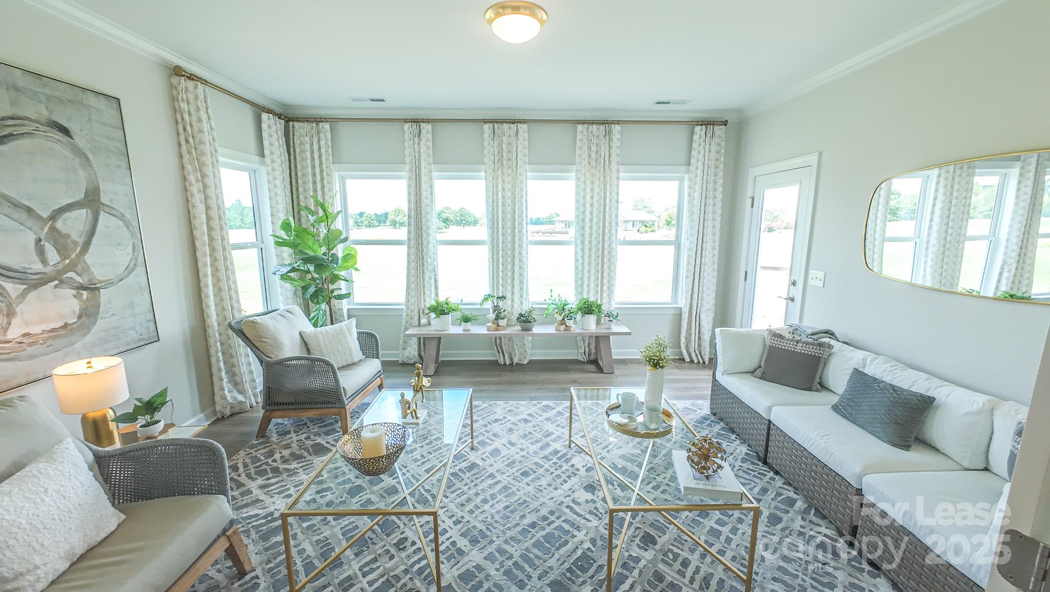 1018 Stone Marker Drive Monroe, NC 28112 - Photo 7 of 24 a living room with furniture and a large window