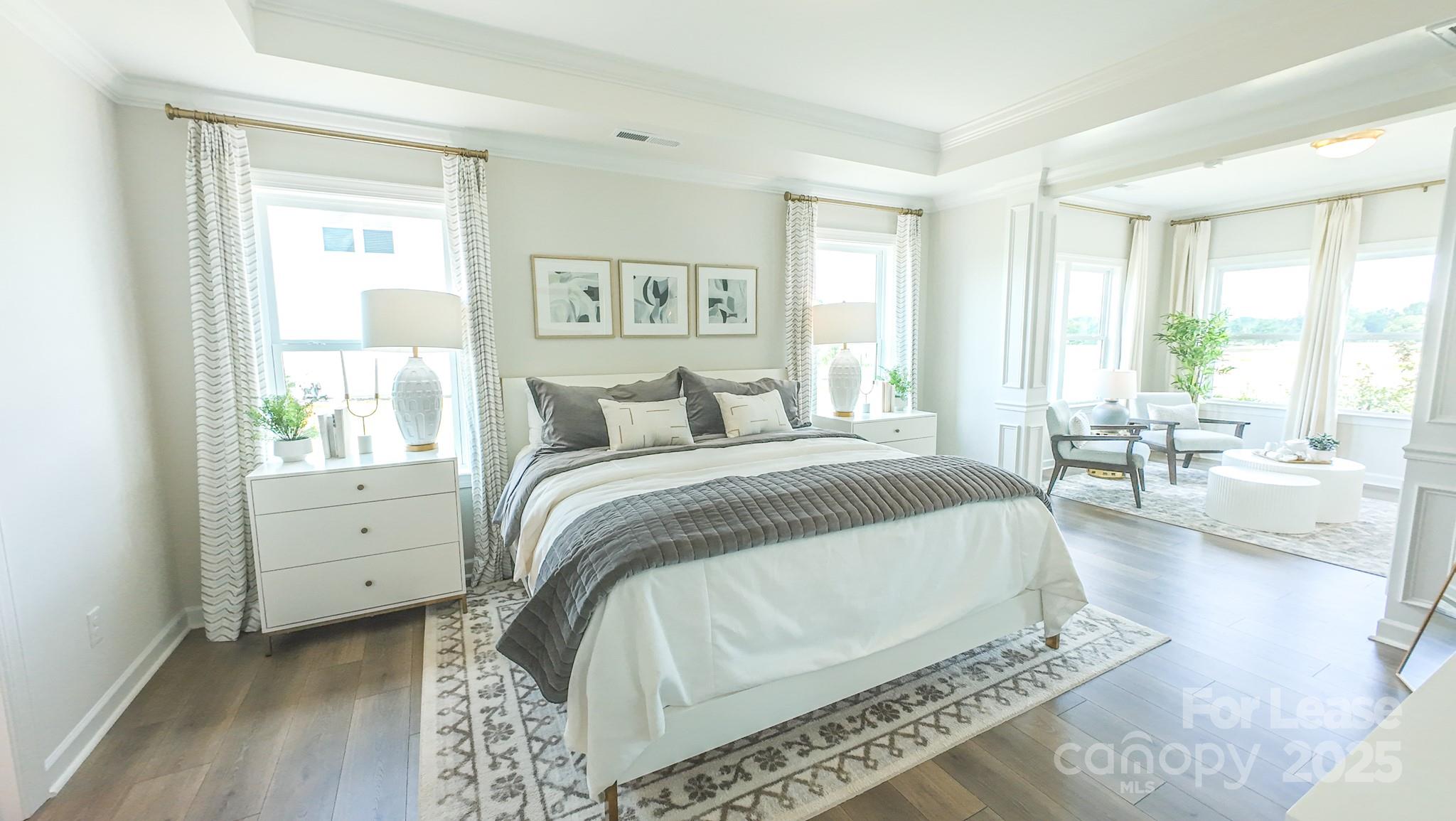 1018 Stone Marker Drive Monroe, NC 28112 - Photo 8 of 24 a spacious bedroom with a large bed and a window