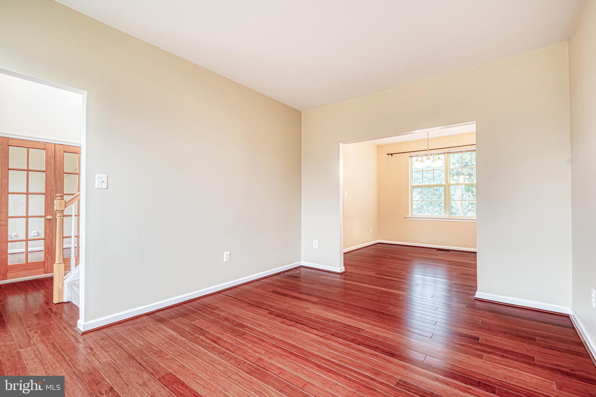 5874 Montgomery Road Elkridge, MD 21075 - Photo 11 of 31 Living room opens up formal dining