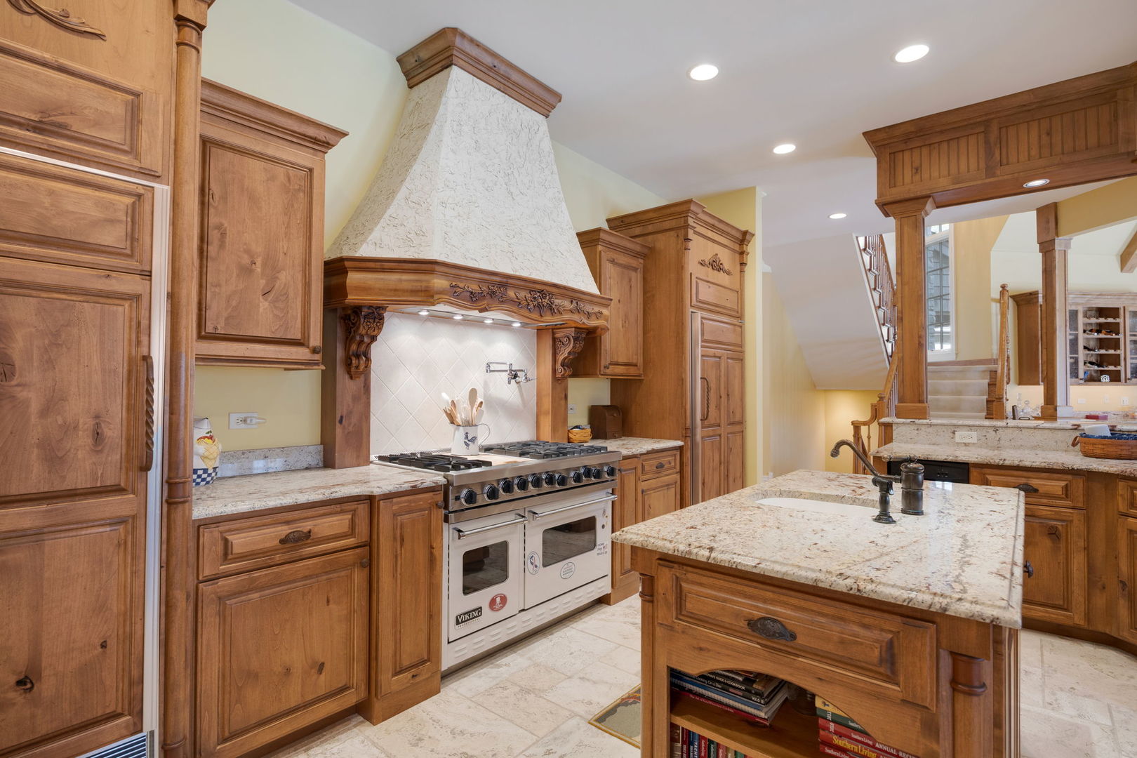 33W551 Hub Road Wayne, IL 60184 - Photo 21 of 59 a kitchen with a stove and a refrigerator