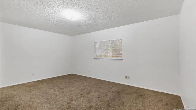 an empty room with a workbench