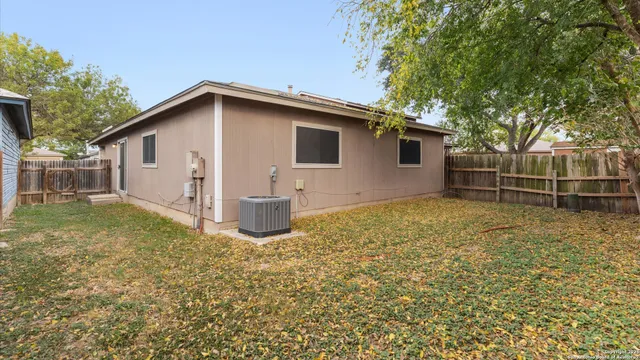 a house with trees in the background