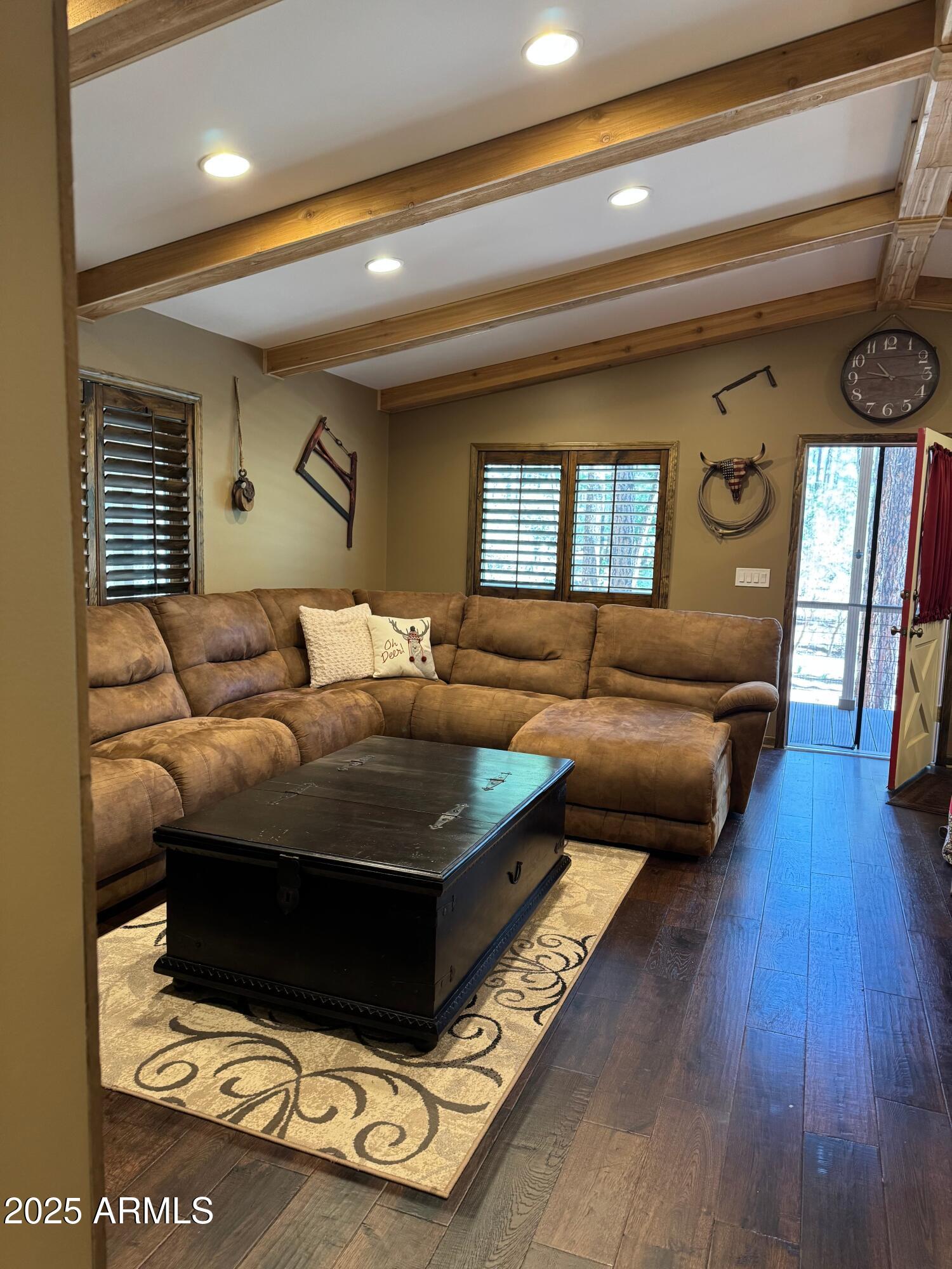 3998 Bloody Basin Road Pine, AZ 85544 - Photo 24 of 71 a living room with furniture and a wooden floor
