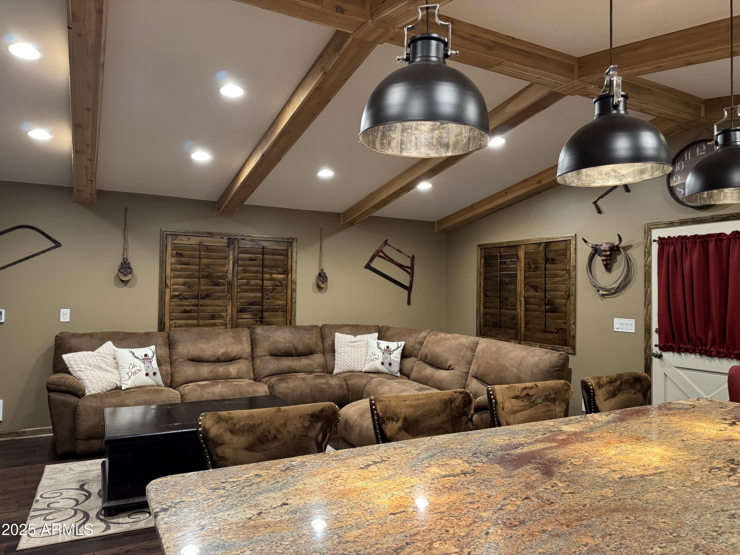 3998 Bloody Basin Road Pine, AZ 85544 - Photo 3 of 71 a living room with furniture and a chandelier