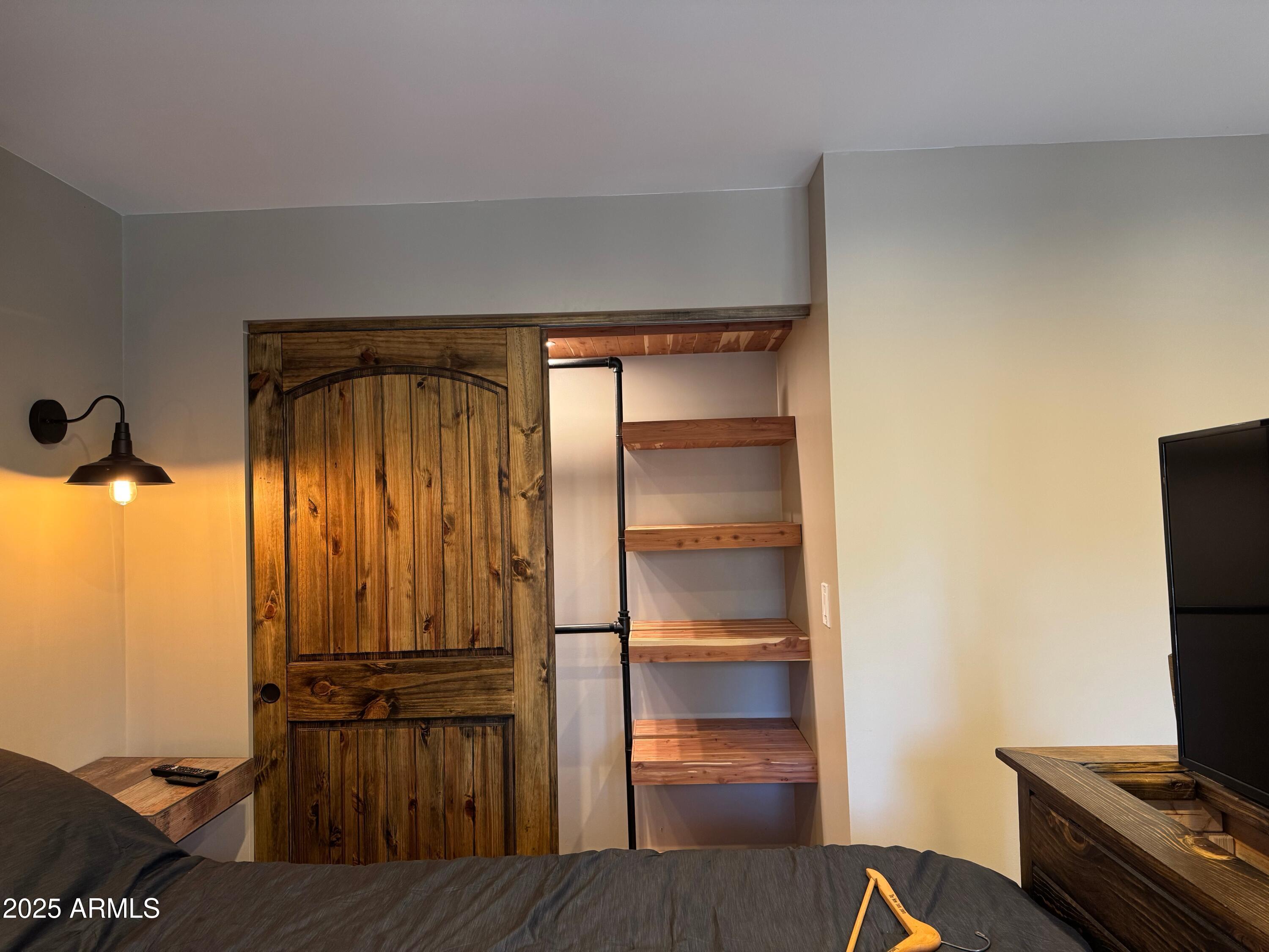 3998 Bloody Basin Road Pine, AZ 85544 - Photo 39 of 71 a view of walk in closet with clothes and shoes