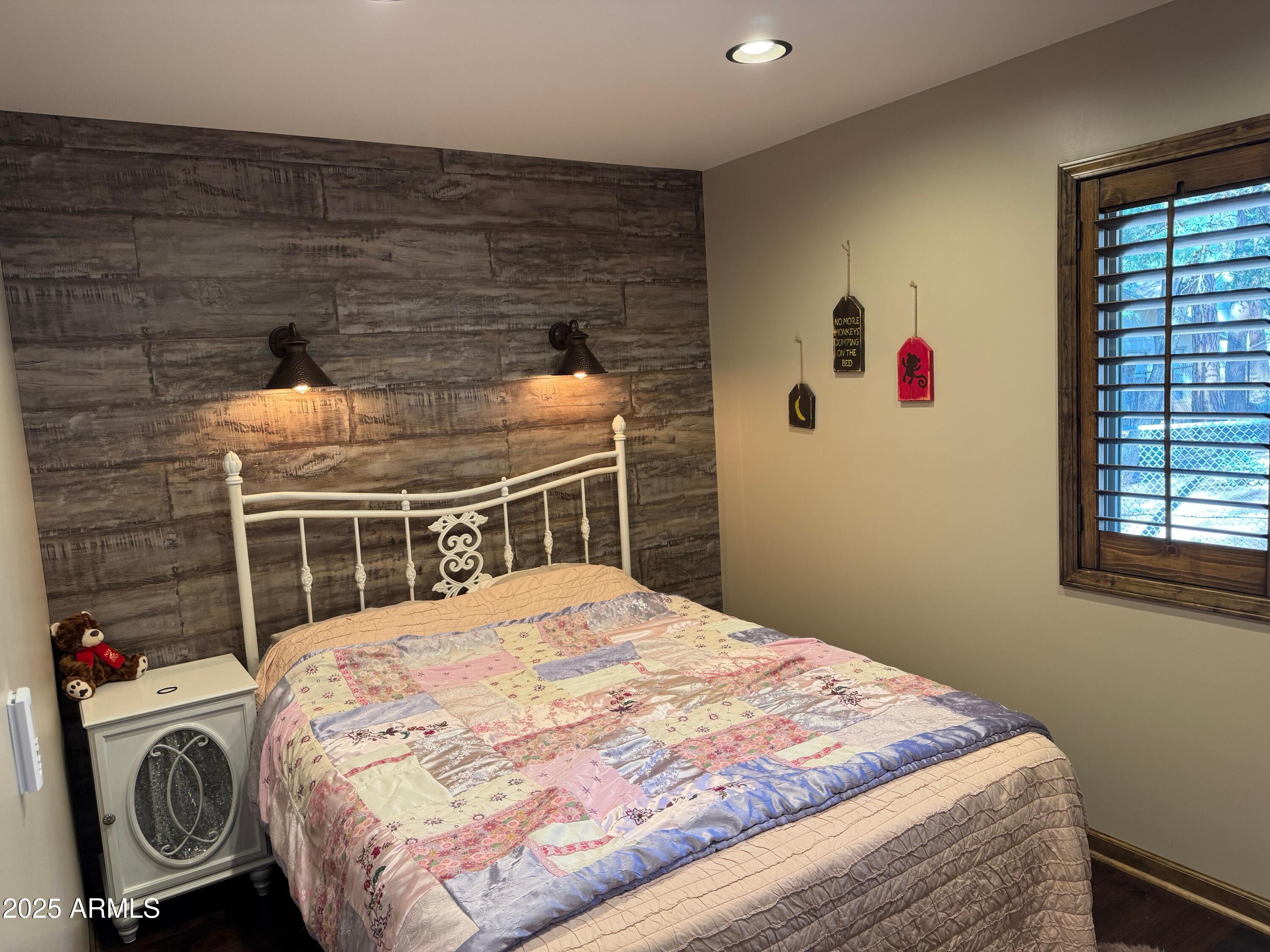 3998 Bloody Basin Road Pine, AZ 85544 - Photo 54 of 71 a bedroom with a bed and dresser