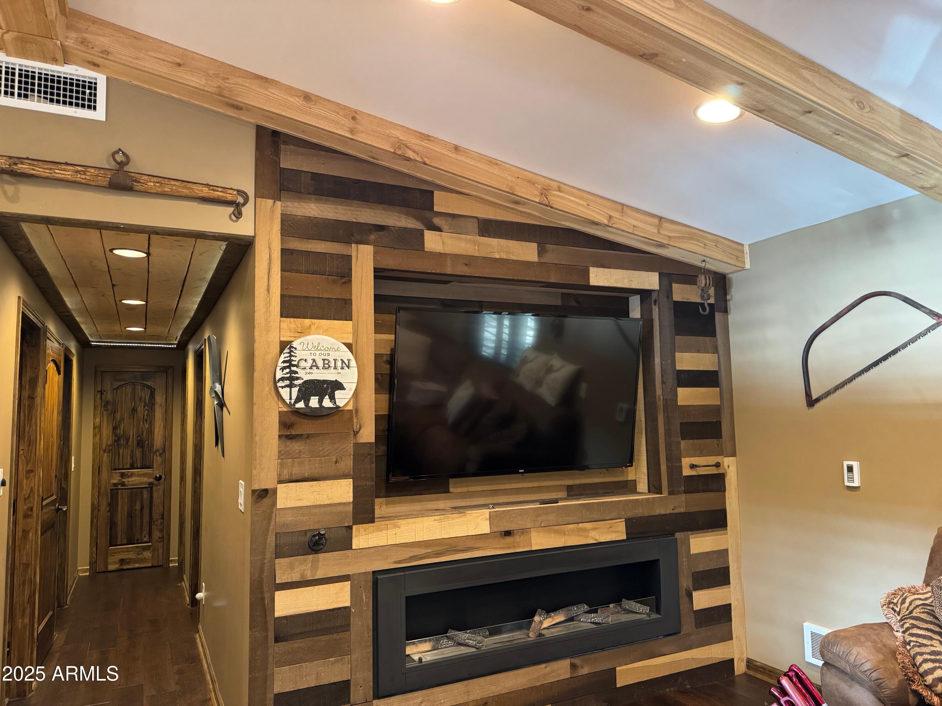 3998 Bloody Basin Road Pine, AZ 85544 - Photo 64 of 71 a living room with furniture and a flat screen tv