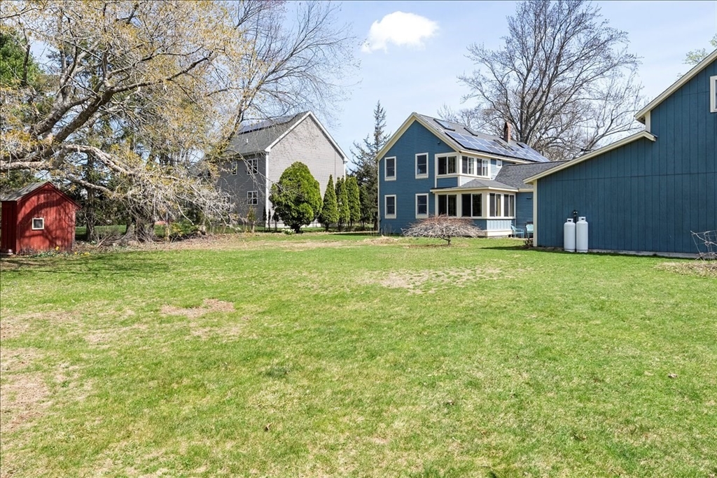 10 2nd Street Natick, MA 01760 - Photo 29 of 31 a view of a house with a big yard and large trees