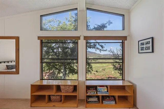 a bathroom with a double vanity sink mirror and toilet