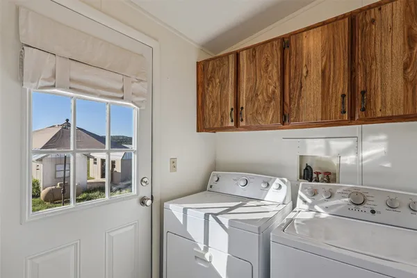 a view of deck with patio and wooden floor