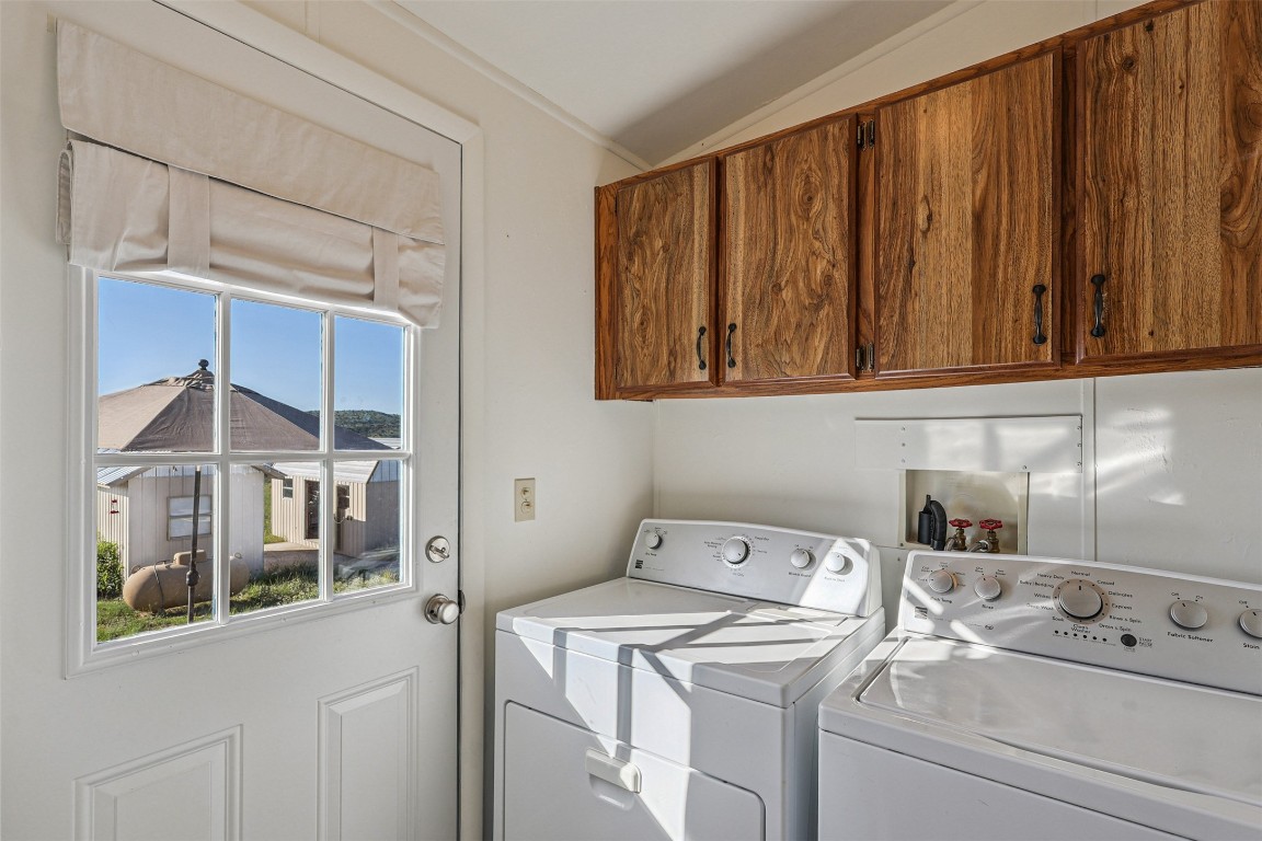 106 Ridge Line Drive Fort Davis, TX 79734 - Photo 25 of 39 a utility room with dryer and washer