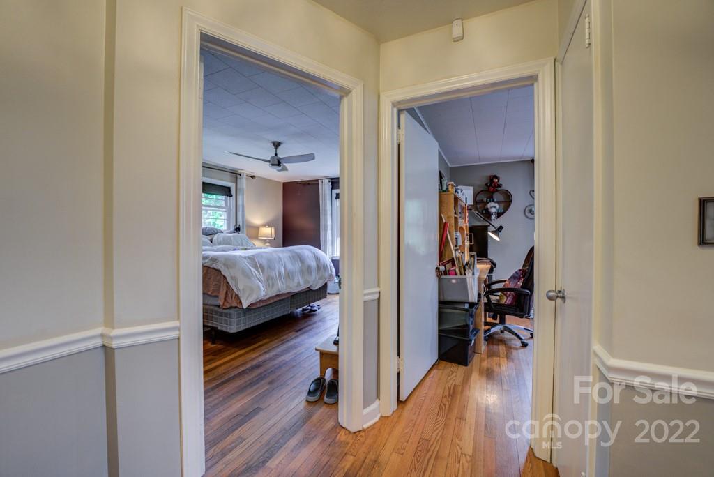 292 Brookside Camp Road Hendersonville, NC 28792 - Photo 12 of 41 a view of a bedroom from a hallway