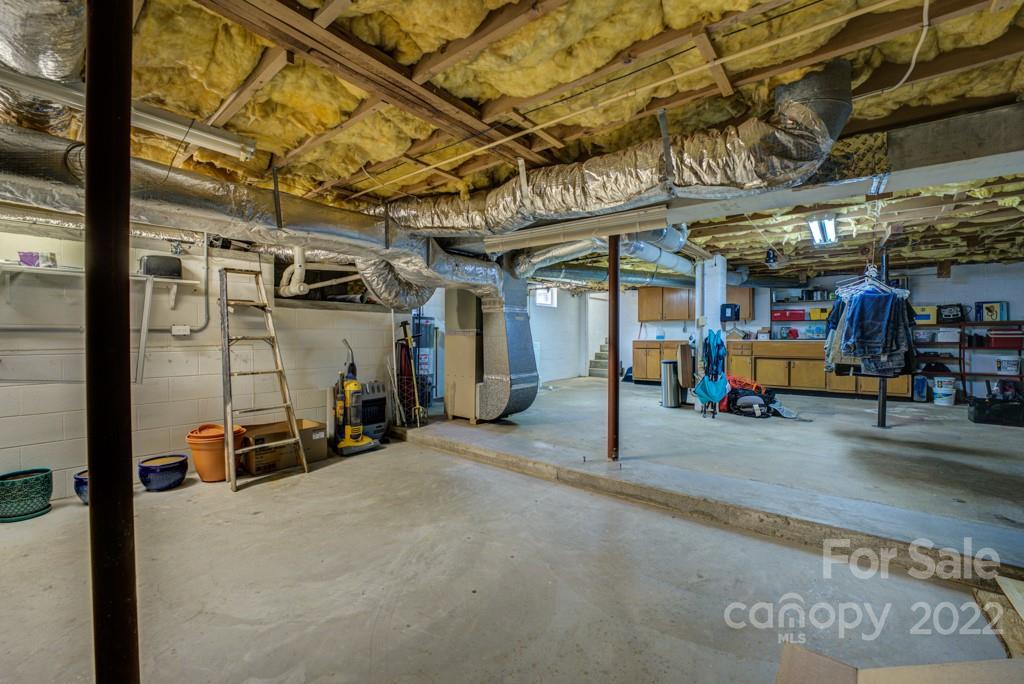 292 Brookside Camp Road Hendersonville, NC 28792 - Photo 23 of 41 a view of a garage with storage