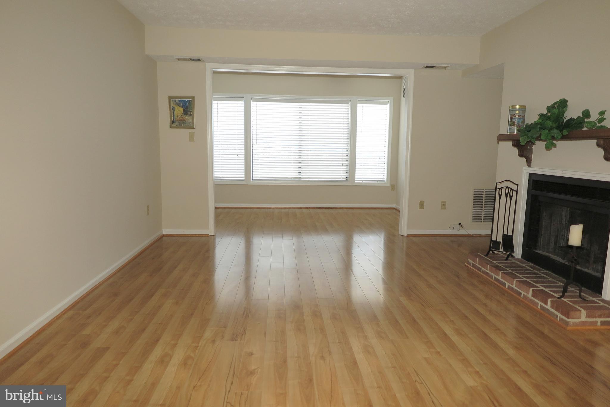Living Room looking into Den/Sunroom